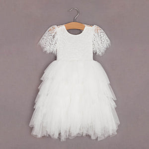 white tulle dress hanging up