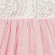 Close-up of a pink tulle skirt with lace top