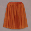 Orange skirt on a gray background