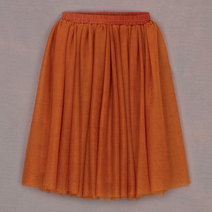Orange skirt on a gray background