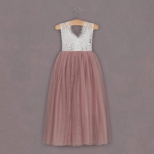 dusty rose tulle dress on hanger 