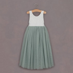 Soft green lace and tulle dress on hanger 