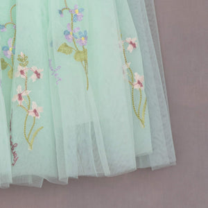 int green embroidered fabric