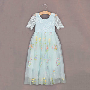 Front of Enchanted Dress on hanger