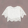 White lace top on a gray background