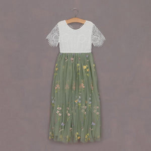 embroidered flower girls dress on hanger