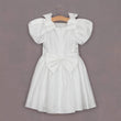 Pretty girls dress with puff sleeves and rear bow