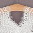 close up of lace on hanger