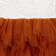 Burnt Orange tulle and lace on close up