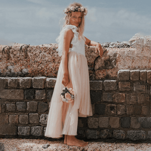 young girl in a flower girl dress
