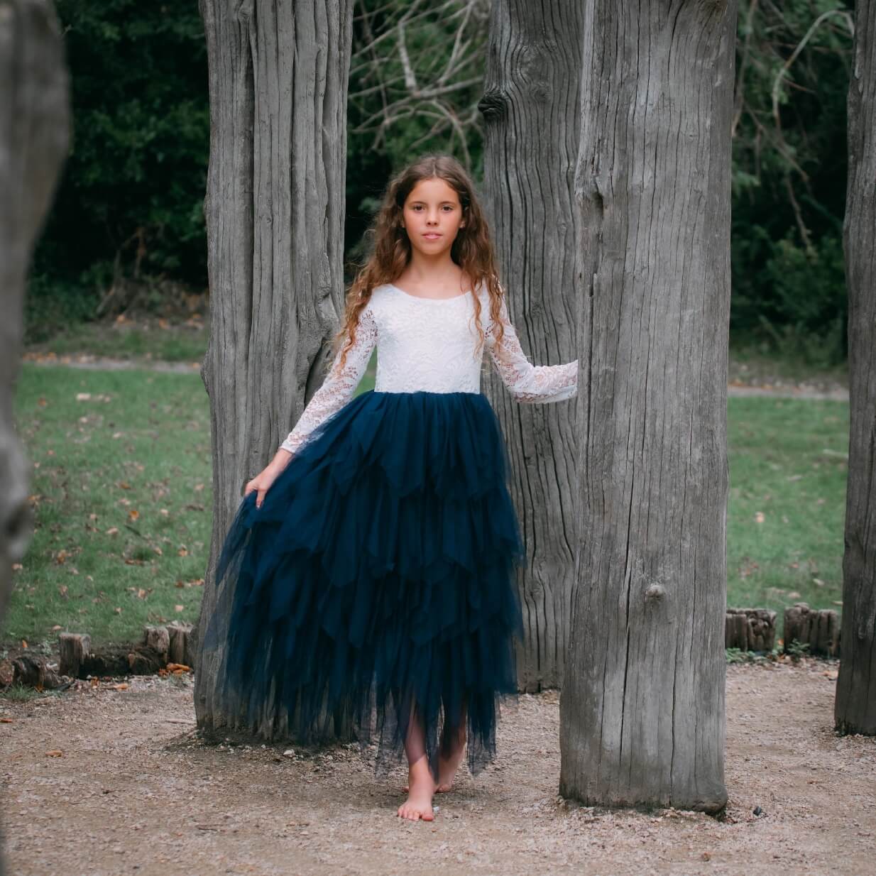 flower girl holding dress
