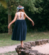 young girl wearing navy blue dress