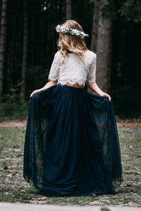 young girl holding dress