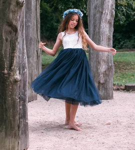 young girl wearing navy blue dress
