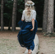 young girl walking in woods