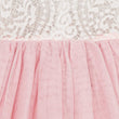 Close-up of a pink tulle skirt with lace top