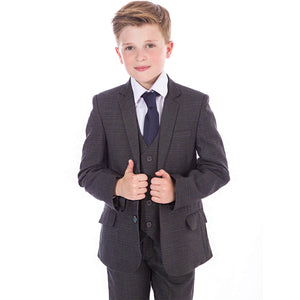 young boy wearing grey suit with jacket