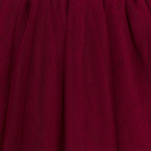 Close-up of a textured burgundy fabric