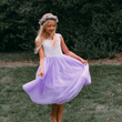 young girl wearing lilac flower girl dress