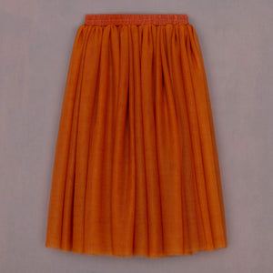 Orange skirt on a plain background