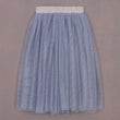 Blue tulle skirt on a plain background