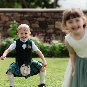 young boy in his kilt