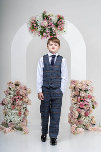 young boy modelling suit
