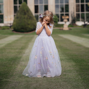 Flower girl wearing the Lilac Enchanted Flower Girl Dress