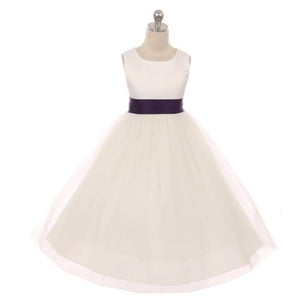 White dress with purple sash