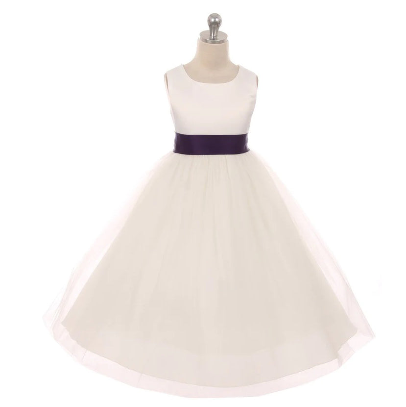 White dress with purple sash