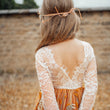 young girl wearing embroidered dress