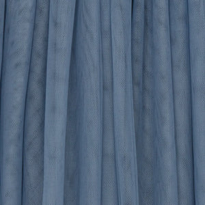 Close-up of blue tulle fabric with a soft texture