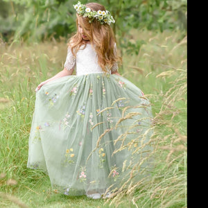 girl gazing at skirt