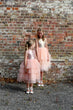 flower girls wearing dresses from uk flower girl boutique