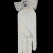 A single white lace glove with a ruffled lace cuff, shown against a solid black background.