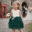 young toddler in hunter green dress