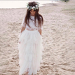 young flower girl on beach