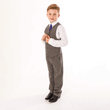 boy modelling tweed trousers and matching waistcoat