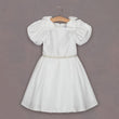 Pretty girls dress with puff sleeves and diamante sash