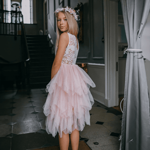 Pretty girl wearing dress and jewelled head piece