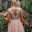 young flower girl in garden close up back of dress