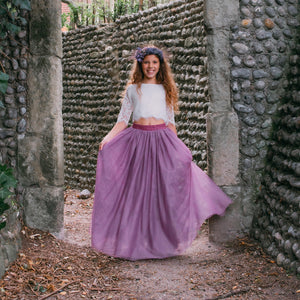 Girl wearing mauve dress