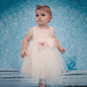 Baby wearing Maya Rose Dress