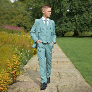 Boy wearing a Otis - Fern 5 Piece Boys Suit from Uk Flower Girl Boutique 