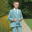 Boy wearing a Otis - Fern 5 Piece Boys Suit from Uk Flower Girl Boutique 