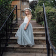 Young girl dancing on stairs