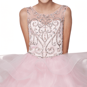 young girl wearing a Pretty pink sequin and rhinestone Dress
