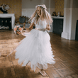 Girl wearing dress and holding flower bouquet