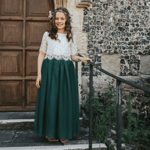 bridesmaid wearing hunter green skirt and lace top