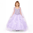 Girl wearing a full length Sequin, Lace and soft Tulle dress